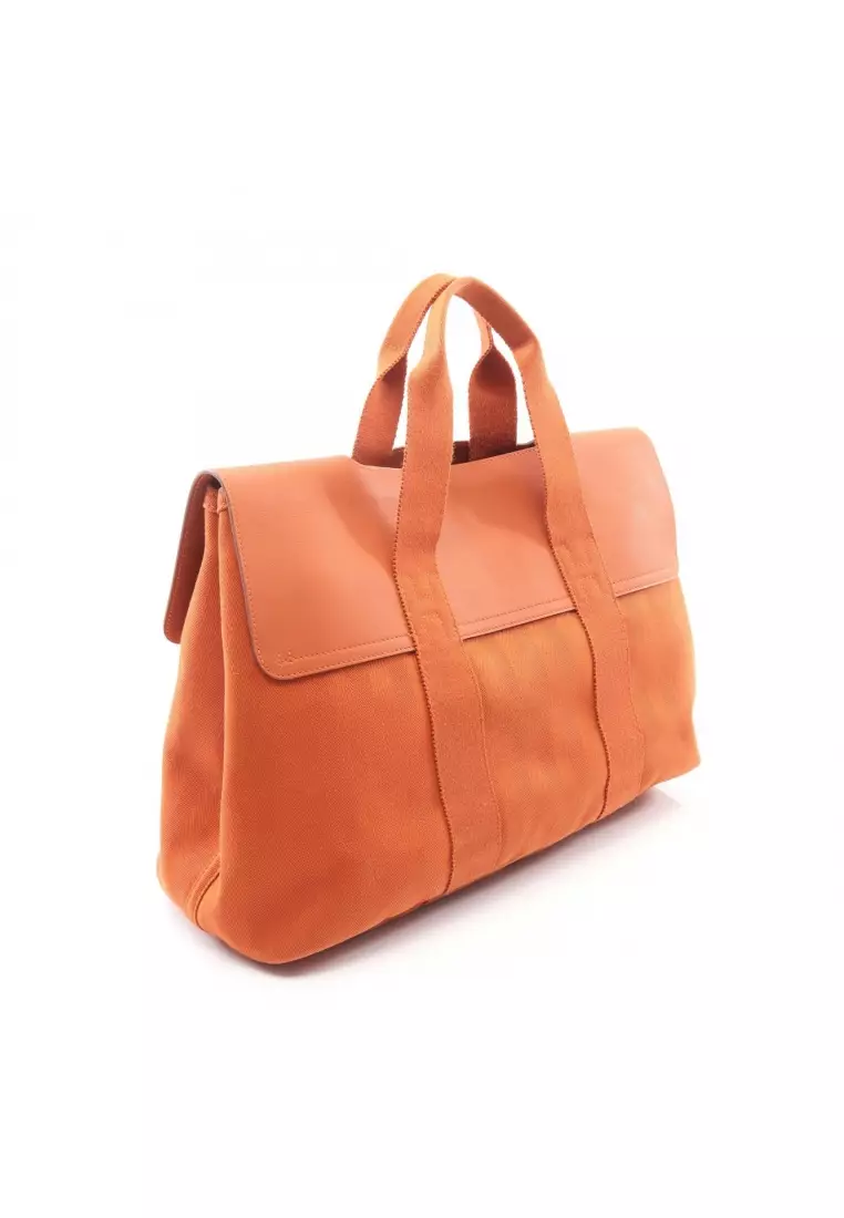 Pre-Loved Hermès Valparaiso MM Potiron Handbag toile chevron leather orange silver hardware