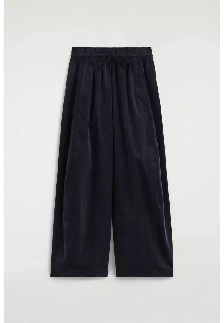 ELASTICATED CORDUROY BARREL-LEG TROUSERS