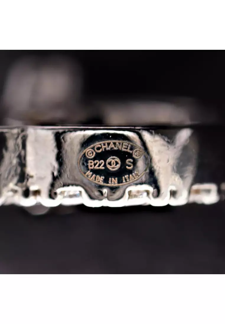 Pre-Loved Chanel coco mark earrings GP Rhinestone gold Silver clear B22S