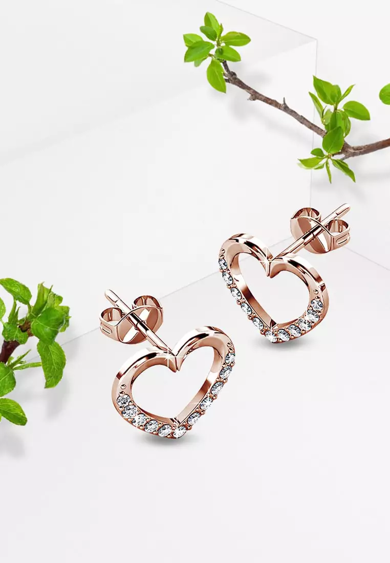 Gold heart sales earrings studs