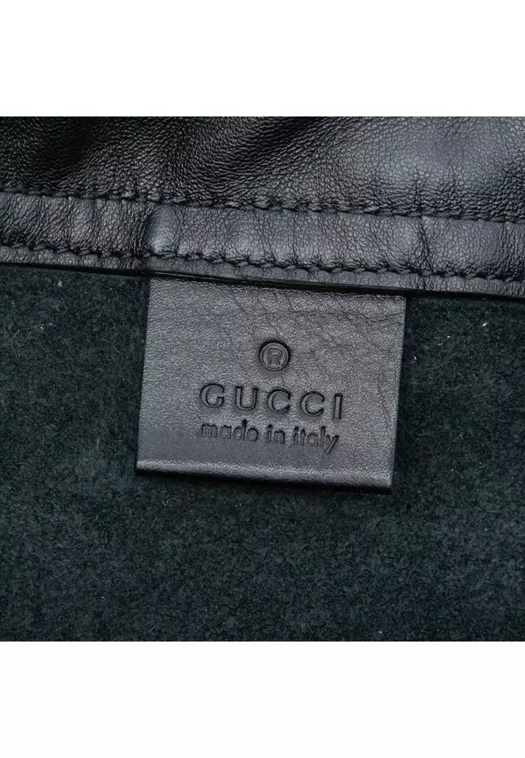 Pre-Loved Gucci Grained Calfskin Web Logo Drawstring Backpack
