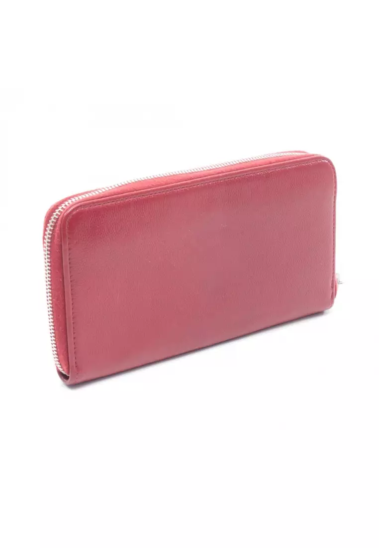 Pre-Loved Chanel round zipper long wallet Caviar skin Red silver hardware