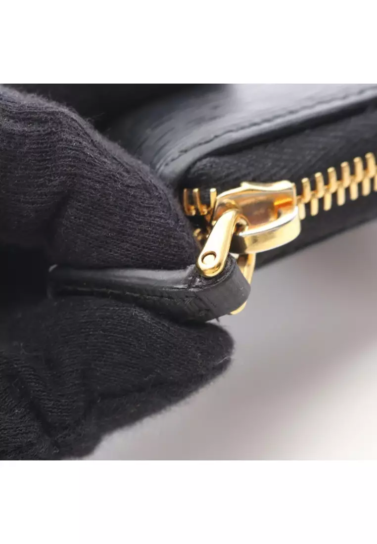Pre-Loved Prada VITELLO MOVE round fastener coin purse Saffiano leather black
