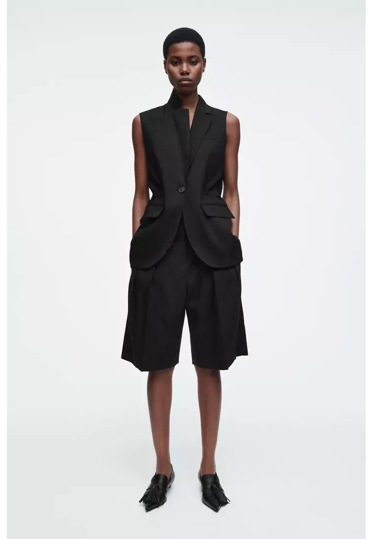 LONGLINE PLEATED LINEN SHORTS