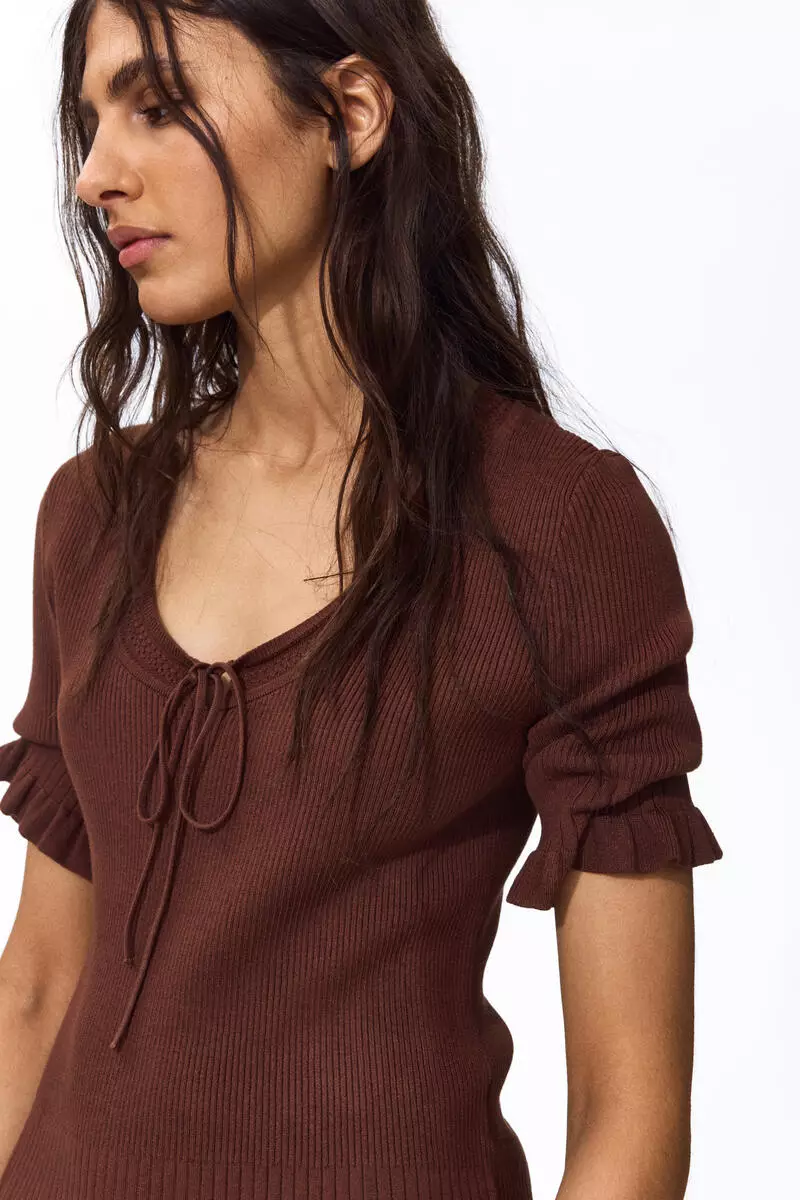 Frill-trimmed rib-knit top