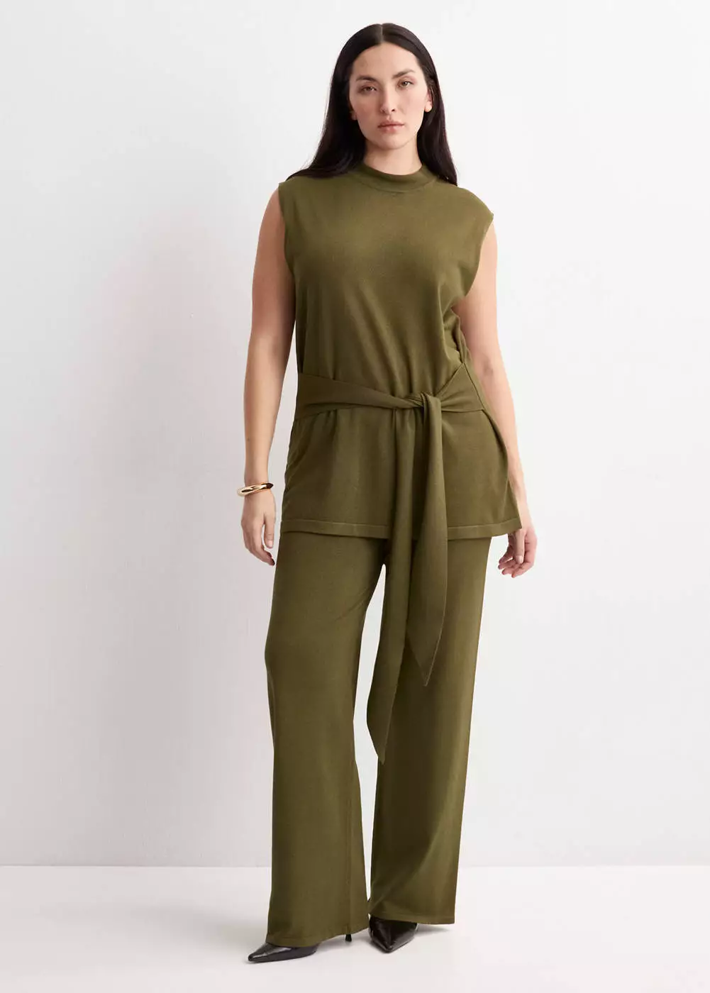 Rompi rajut dengan ikat pinggang