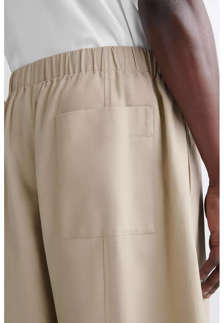 COS COTTON CROPPED RELAXED-FIT BARREL-LEG TROUSERS 2026 | Buy COS