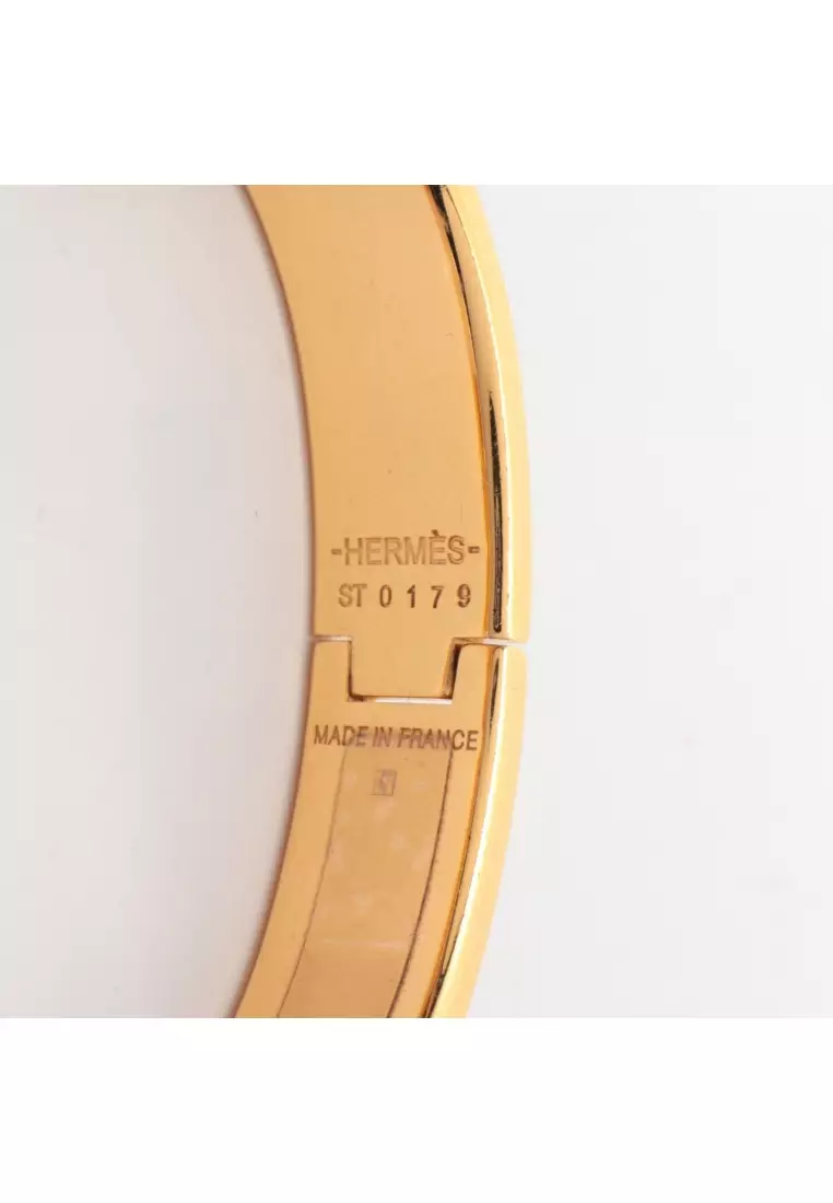 Pre-Loved Hermès Click Cadena PM bangle GP gold beige