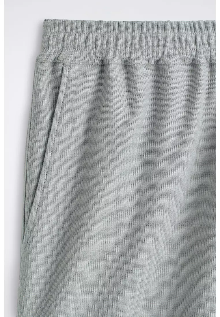 ELASTICATED COTTON-PIQUÉ SHORTS