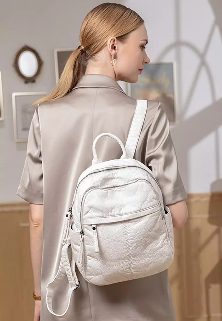 White leather discount backpack purse