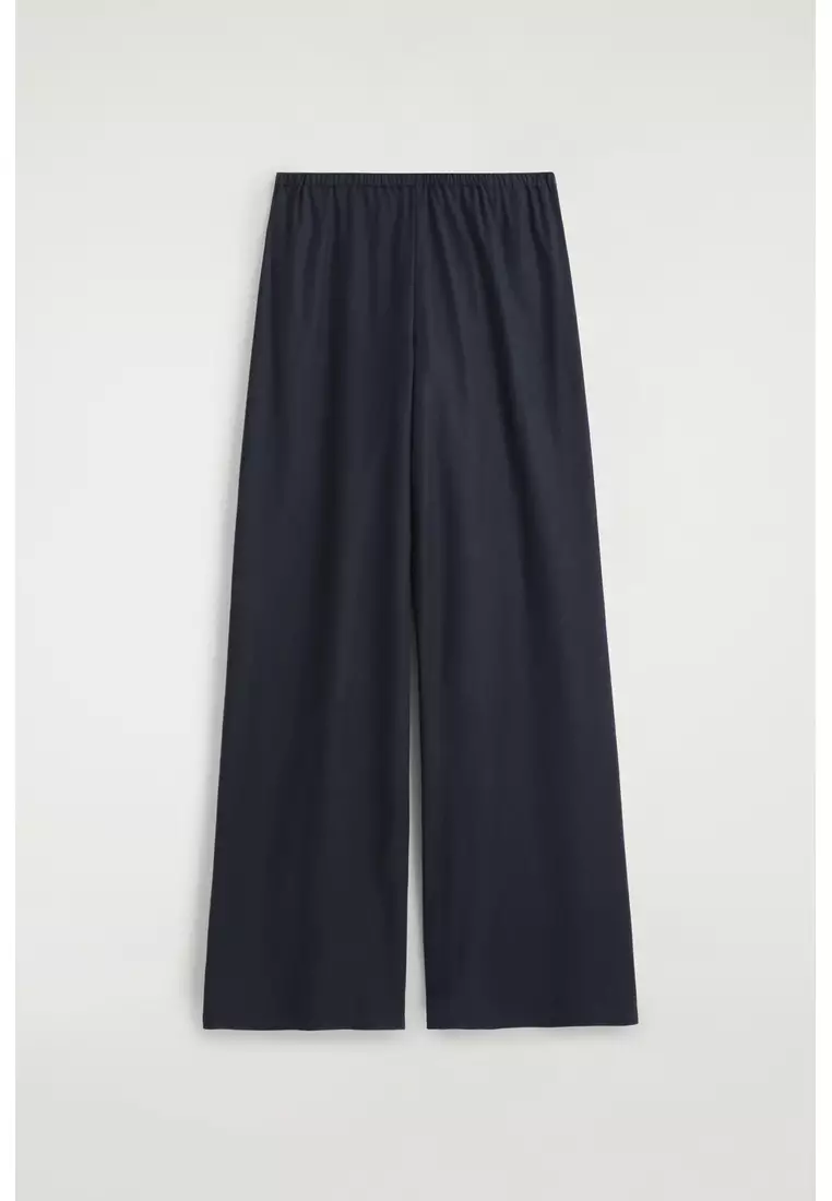 ELASTICATED WIDE-LEG TROUSERS