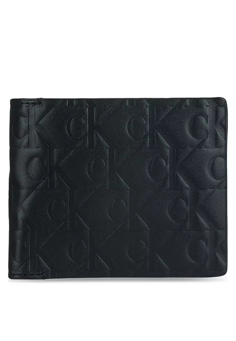 Calvin klein monogram wristlet deals