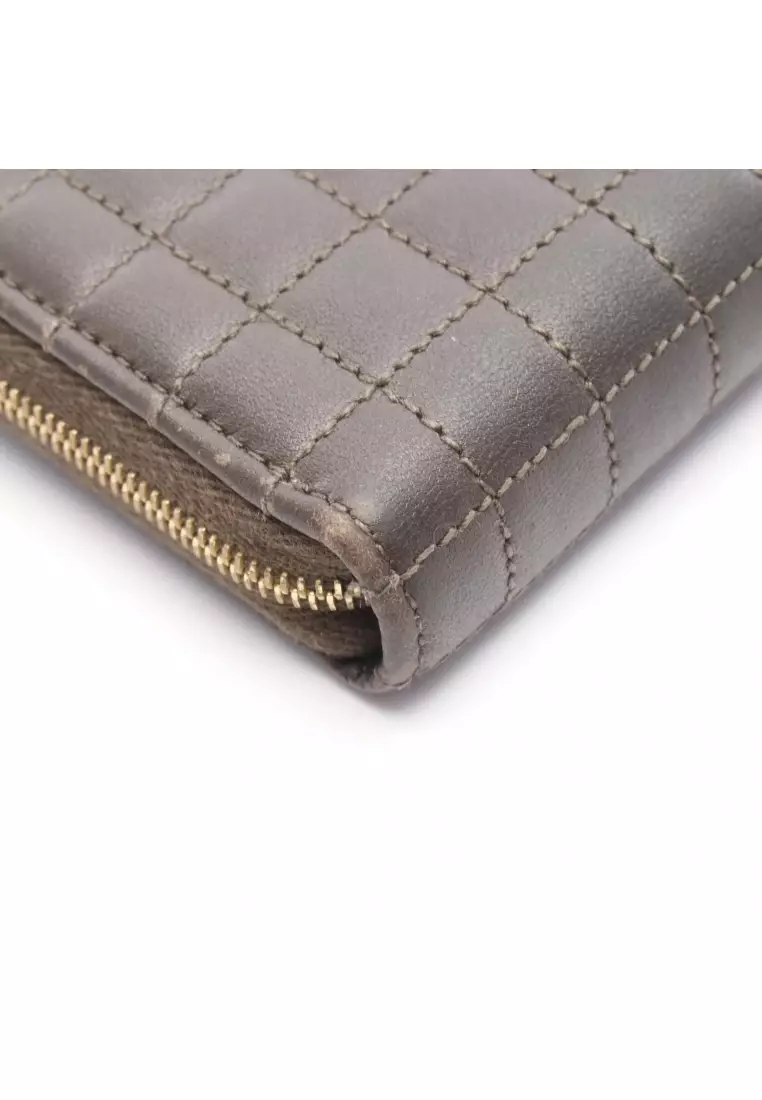 Pre-Loved Celine C-charm large zipped wallet round zipper long wallet quilting leather Khaki brown