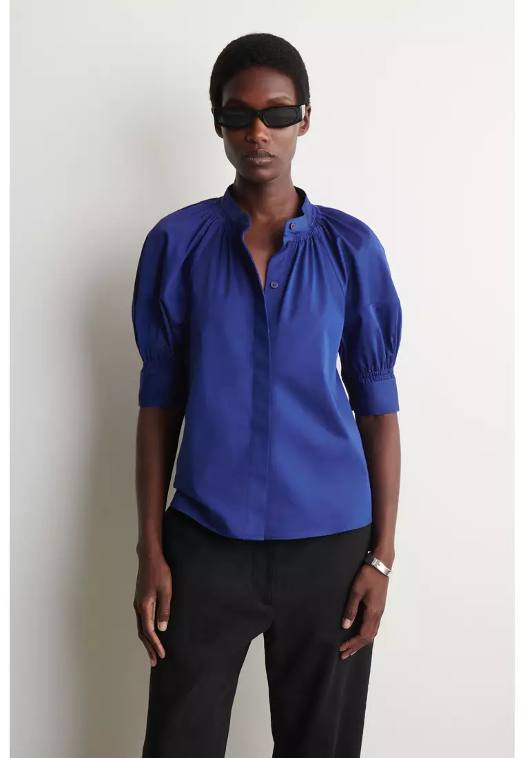 Buy COS SMOCKED PUFF-SLEEVE BLOUSE 2026 Online | ZALORA