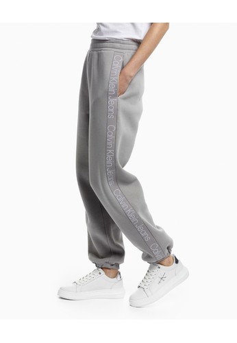 Jual Calvin Klein CK Jeans URBAN MINIMAL TAPE SWEATPANTS - Grey Original 2023 | Indonesia ®