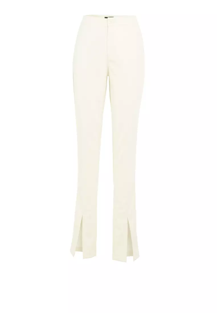 Topshop faux leather skinny pants with front hem slits in off white