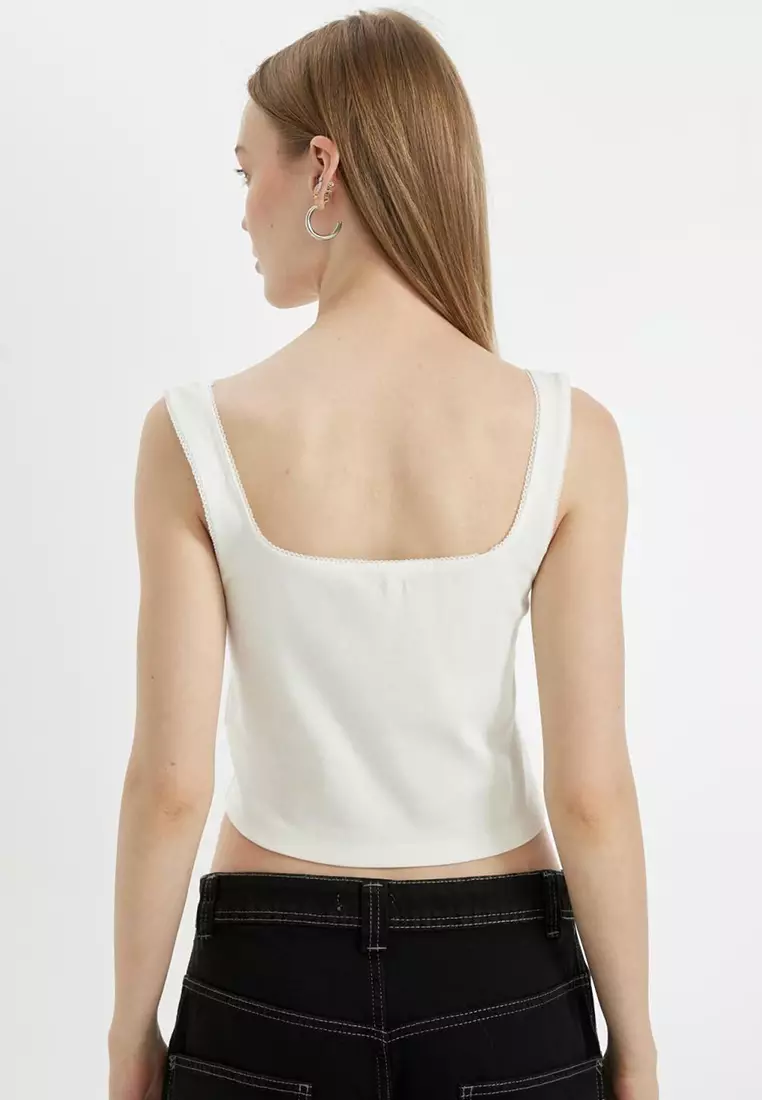 綴有束腰細節的涼感修身上衣