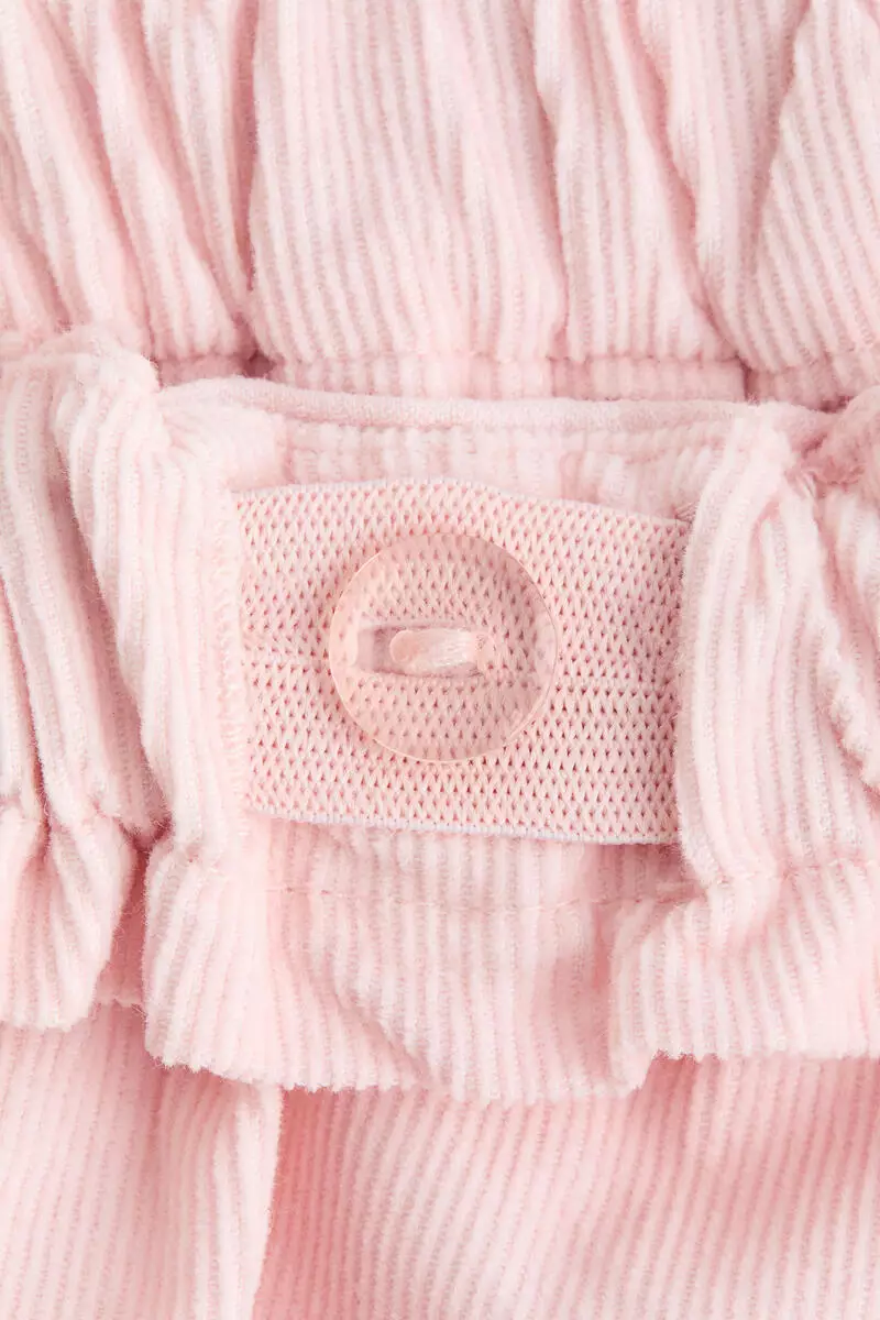 Frill-trimmed corduroy trousers