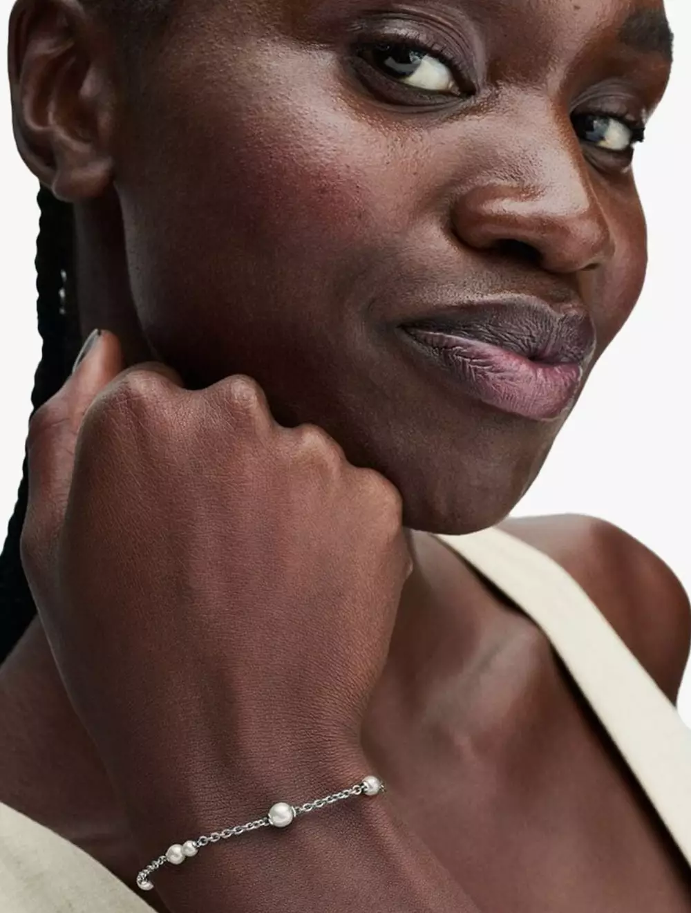 Sterling silver bracelet with white treated freshwater cultured pearl and clear cubic zirconia