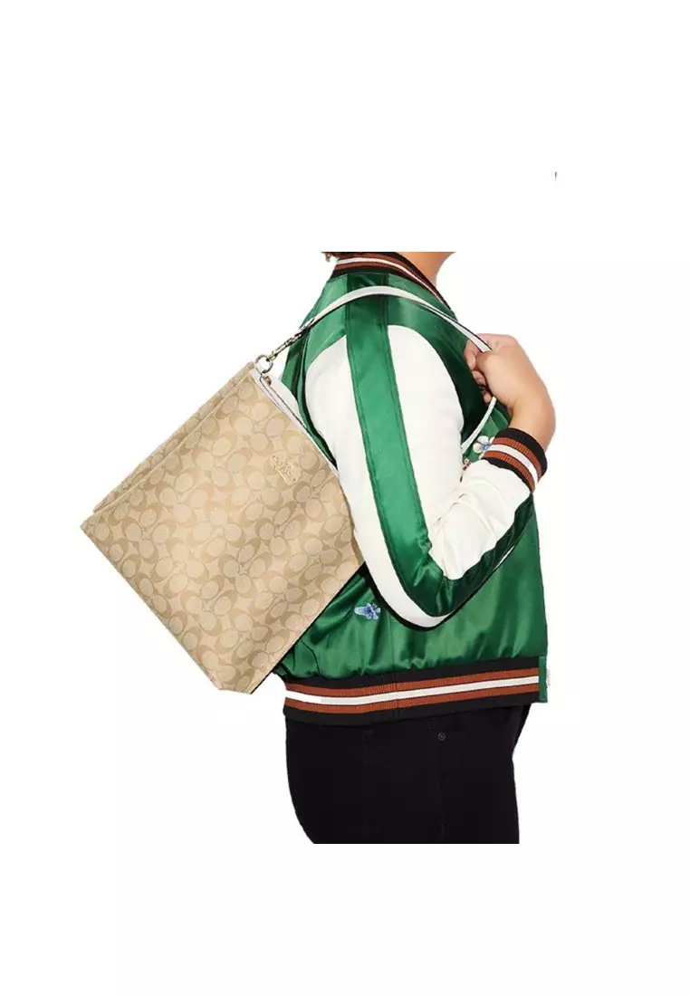 Buy Coach Coach Mollie Bucket Bag In Signature Canvas (CA561) IM