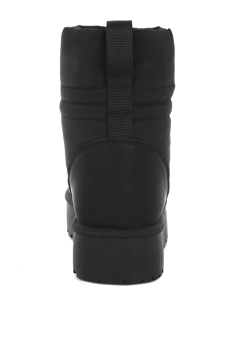 Sepatu bot salju tebal dengan pergelangan kaki tinggi berwarna hitam