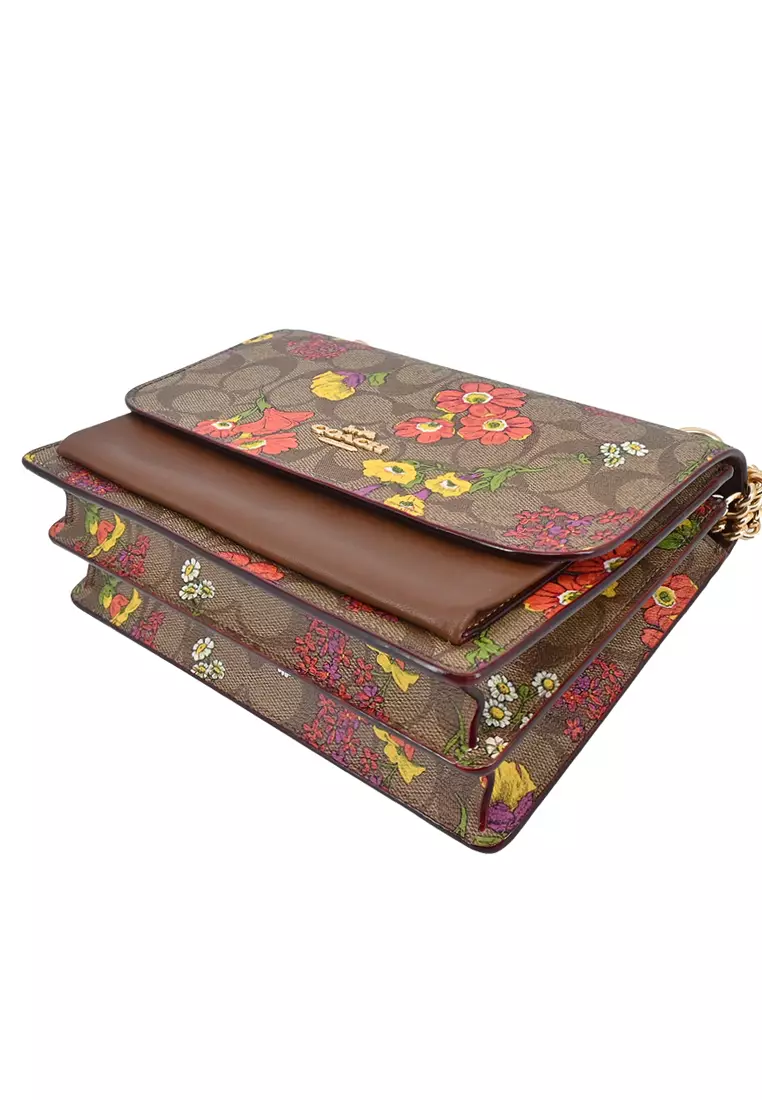 Klare Crossbody Bag In Signature Canvas With Floral Print - Brown/Multi