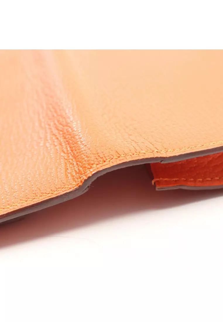 Pre-Loved Hermès bear souffle orange poppy Bi-fold Long Wallet Chevre orange silver hardware X stamp