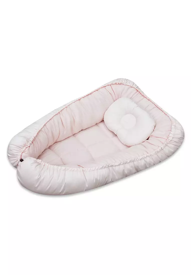 Baby snuggle deals bed