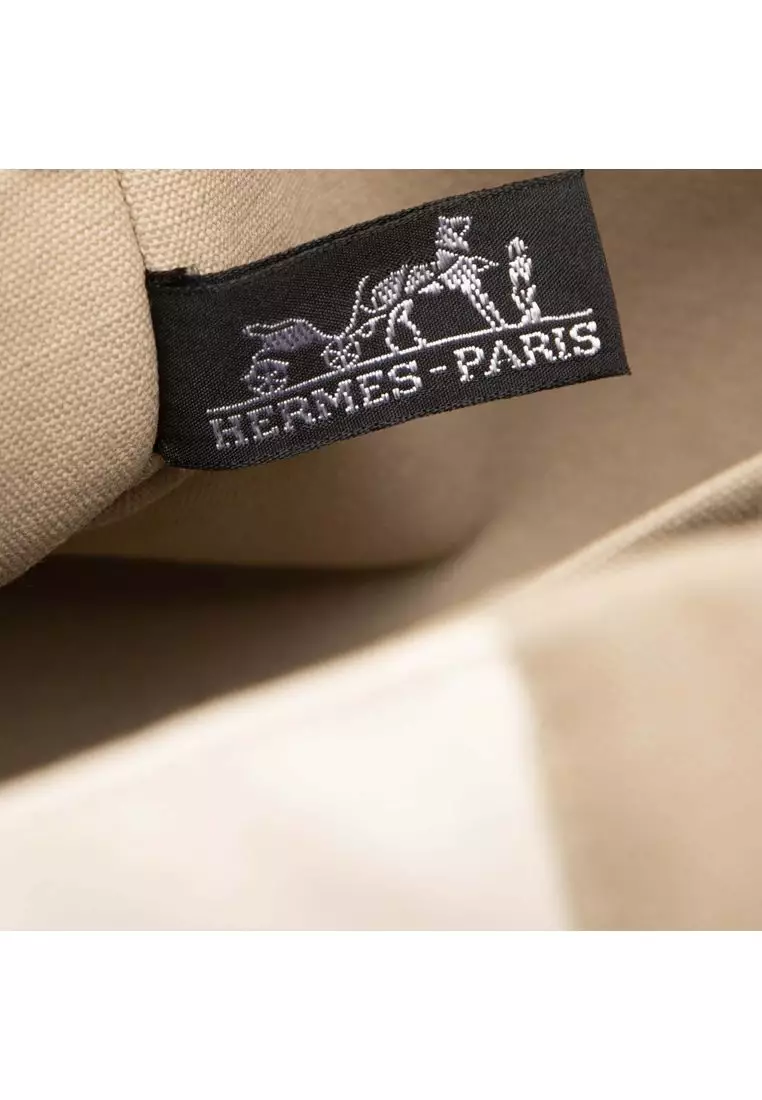 Pre-Loved Hermès Bicolor Canvas Tapis De Selle Clutch