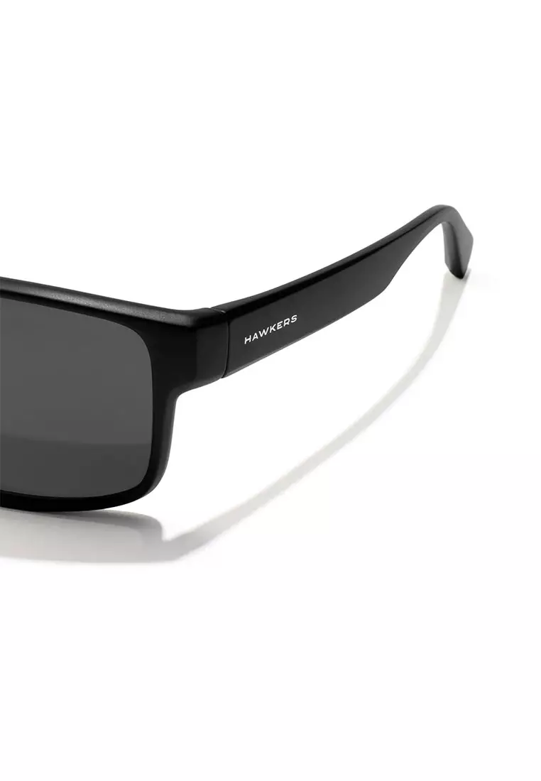 HAWKERS Black Dark FASTER Sunglasses for Men and Women. UV400 Protection. Official Product Designed in Spain