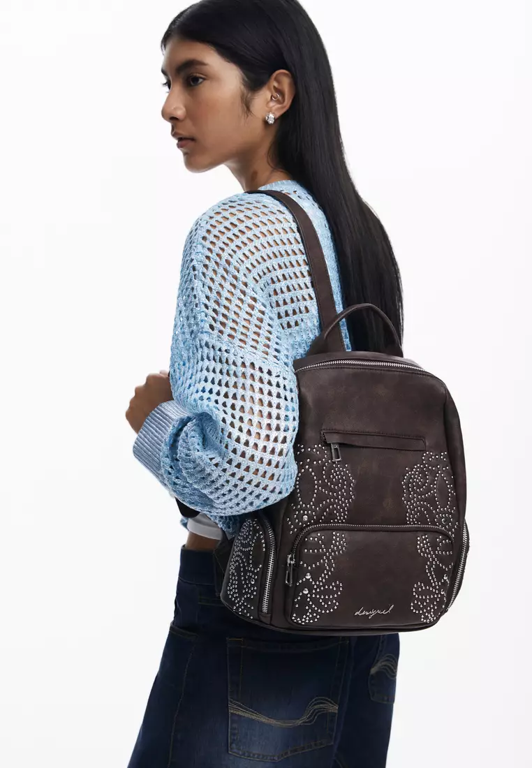 Small backpack with studded pockets