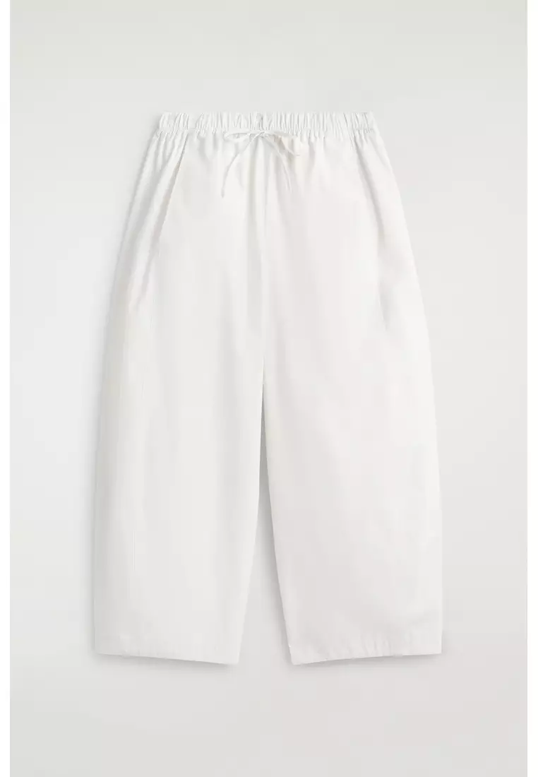 ELASTICATED BARREL-LEG TROUSERS