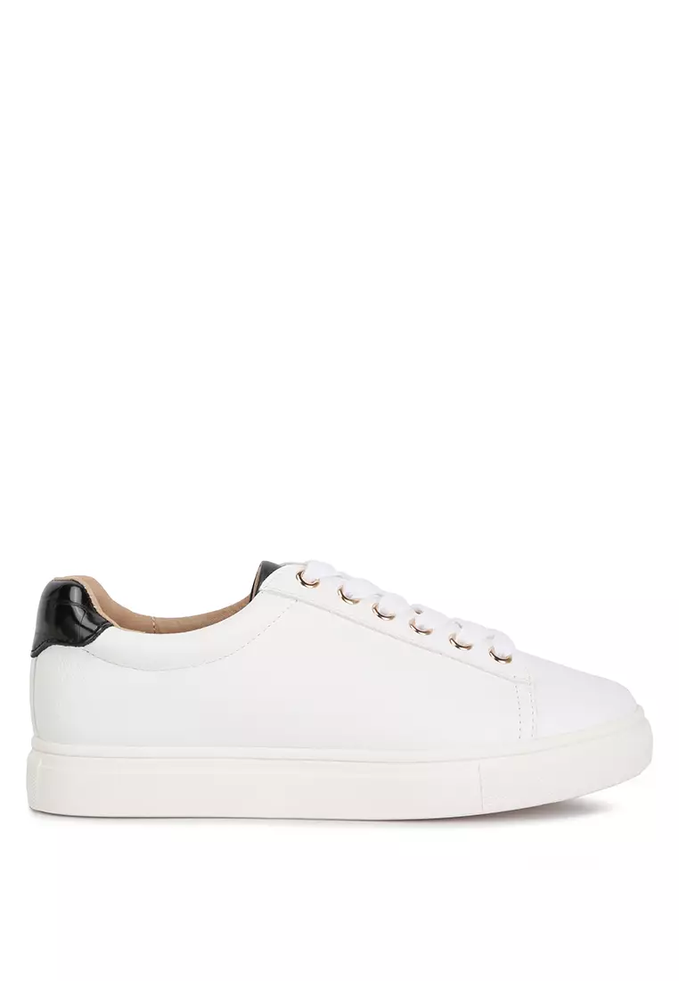 White trainers with black on sale back