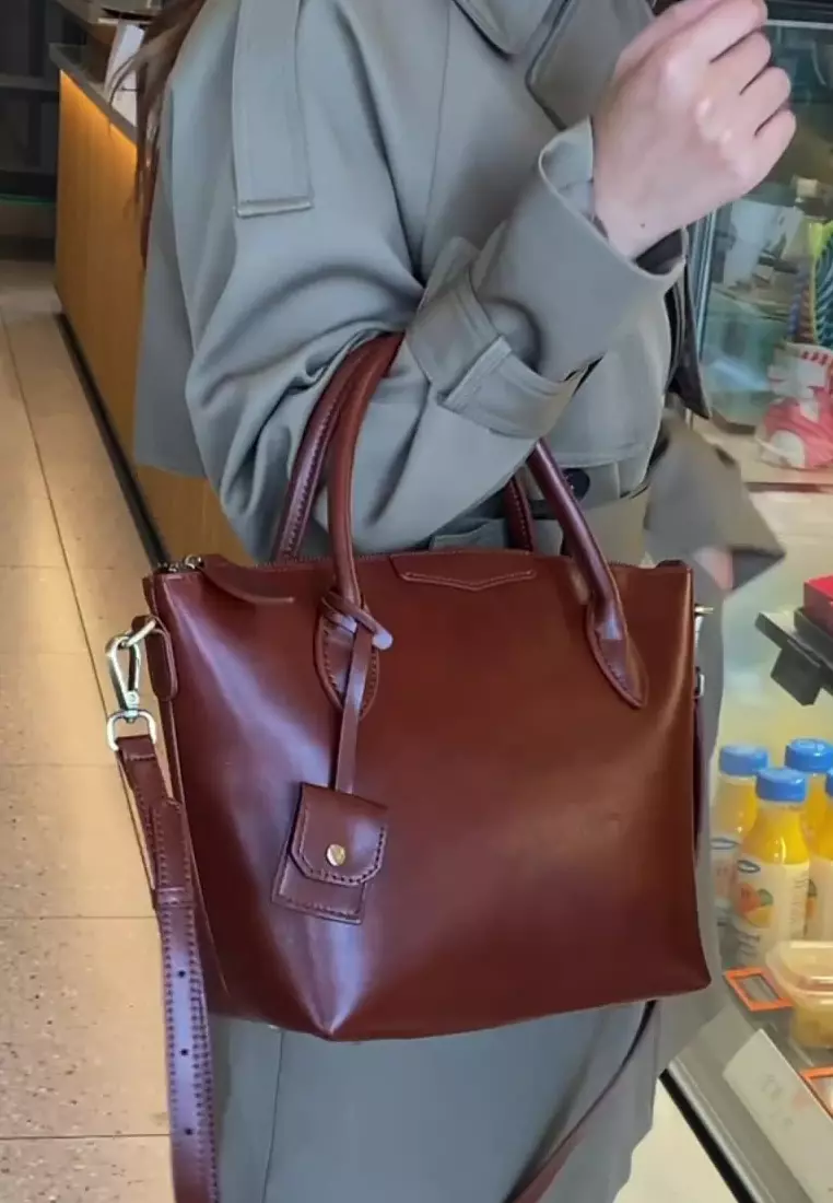 Fashion niche high-end genuine leather hand-held crossbody bag