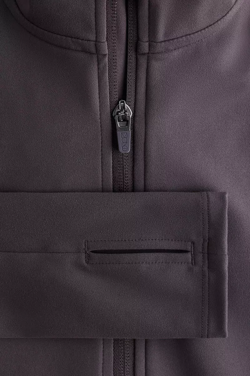 Zip-through sports jacket with SoftMove™