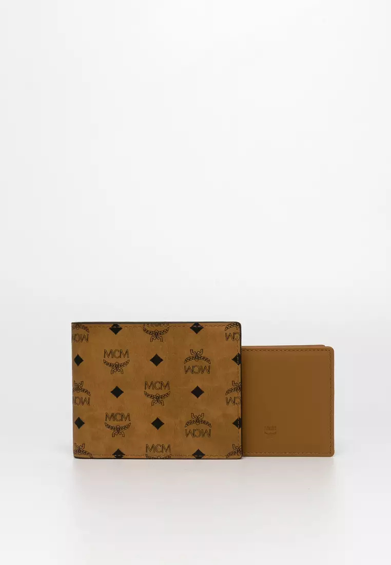 Mcm wallet price best sale