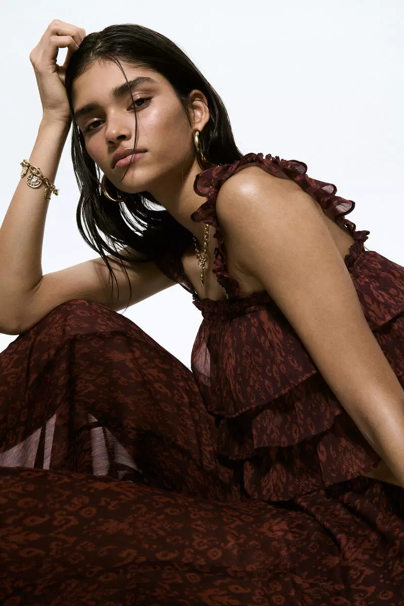 Flared crinkled trousers