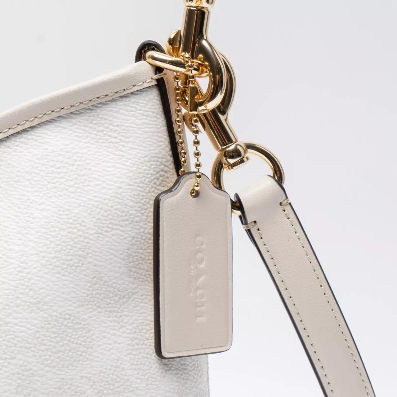 Laurel Shoulder Bag in Signature Canvas White/Chalk