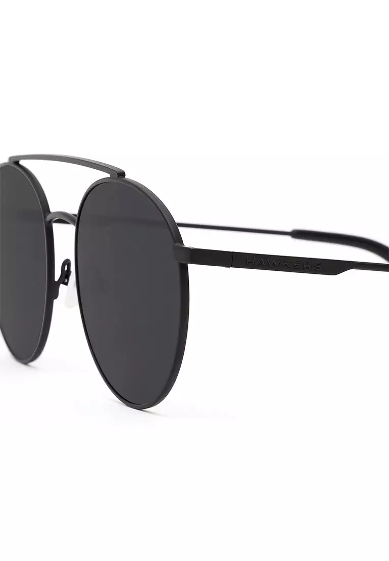 HAWKERS Black Dark HILLS Sunglasses for Men and Women, unisex. UV400 Protection. Official product designed in Spain