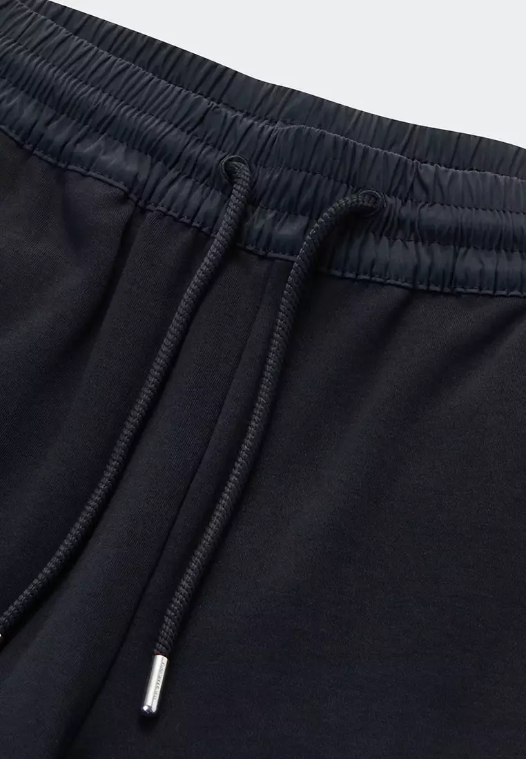 FILA FUSION INLINE FUSIONEER Women Knit Pants (White / Black)