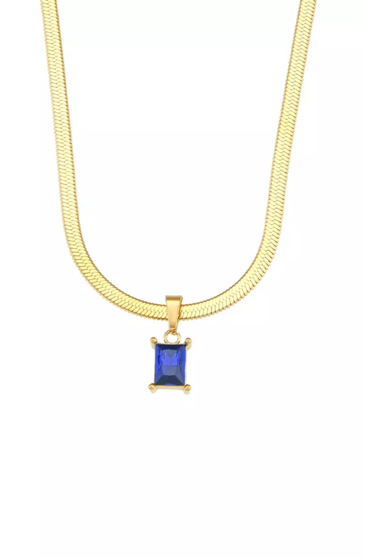 Gold necklace with blue pendant outlet