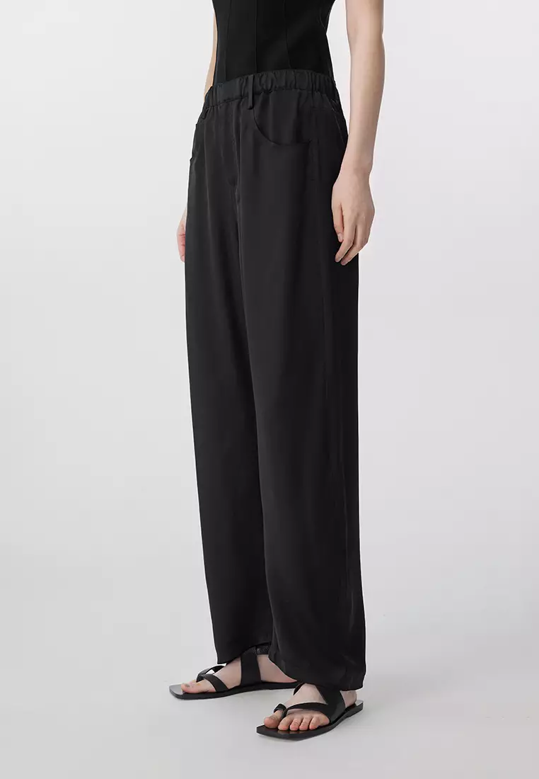 Curled extra-long trousers