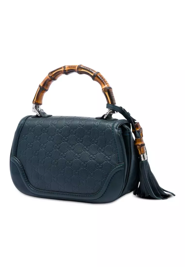 Pre-Loved Gucci Medium Guccissima New Bamboo Top Handle Bag
