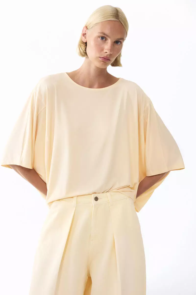 Batwing-sleeved top