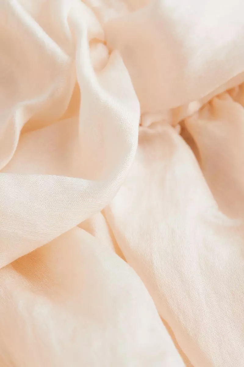 Puff-sleeved cropped peplum blouse