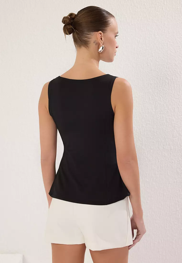 Black Peplum Fitted/Body-Smoothing Knitted Blouse TWOSS25BZ00265