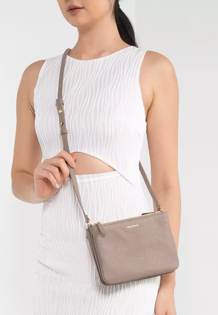 Coccinelle sling online bag