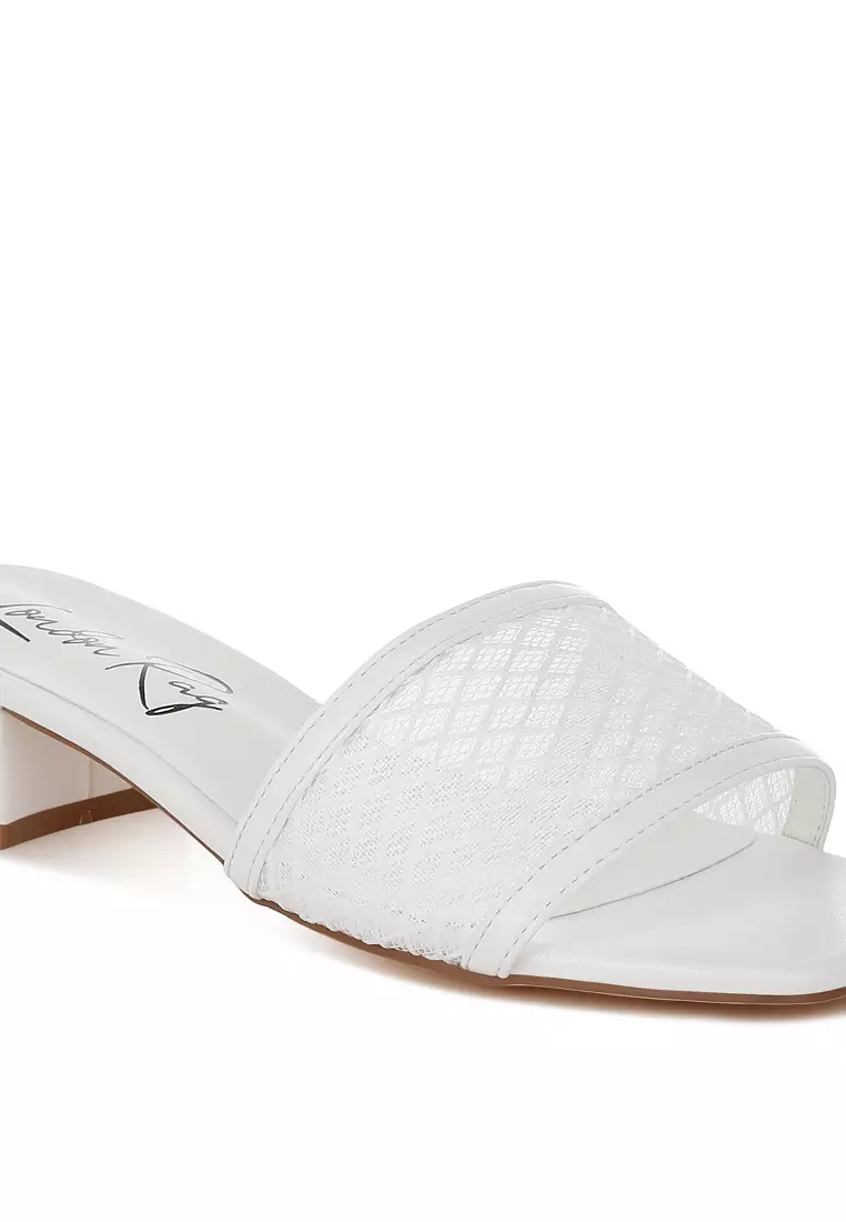 Sepatu hak rendah slip-on warna putih