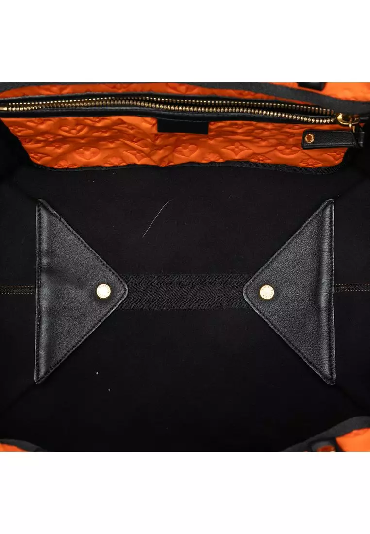 Pre-Loved Louis Vuitton Monogram Embossed Neoprene Scuba Mm