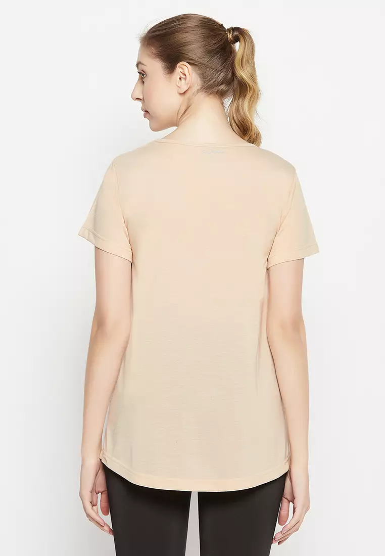 Clovia Comfort Fit Longline Active T-shirt in Cream Colour